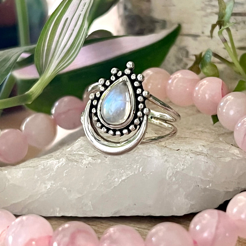 An enchanting Online Only Exclusive Teardrop Moonstone Ring featuring a crescent moon design, available for purchase at our Super Silver online store.