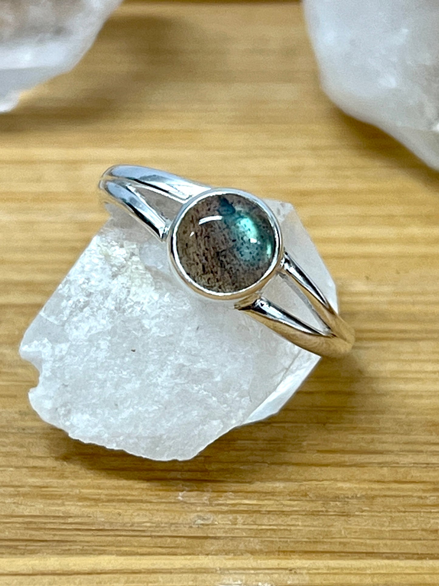 
                  
                    Circular Minimalist Stone Ring in sterling silver with moonstone accents by Super Silver.
                  
                