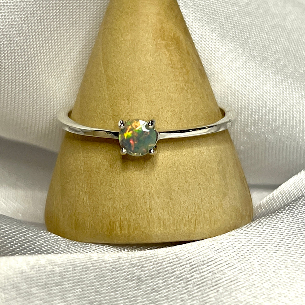 
                  
                    An elegant Dainty Prong Set Facet Cut Ethiopian Opal Ring, making a subtle statement.
                  
                
