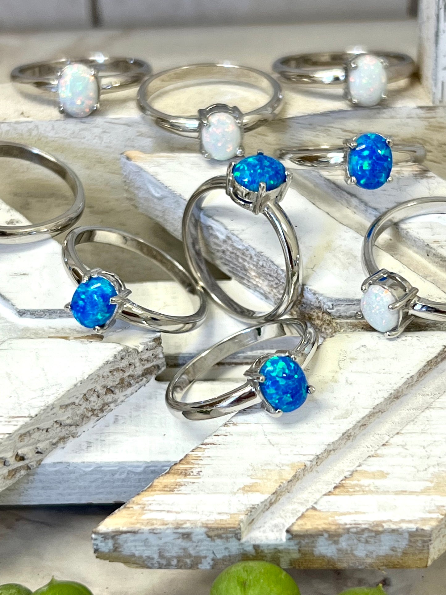 Super Silver's Simple Pronged Opal Ring featuring a blue lab-created opal.