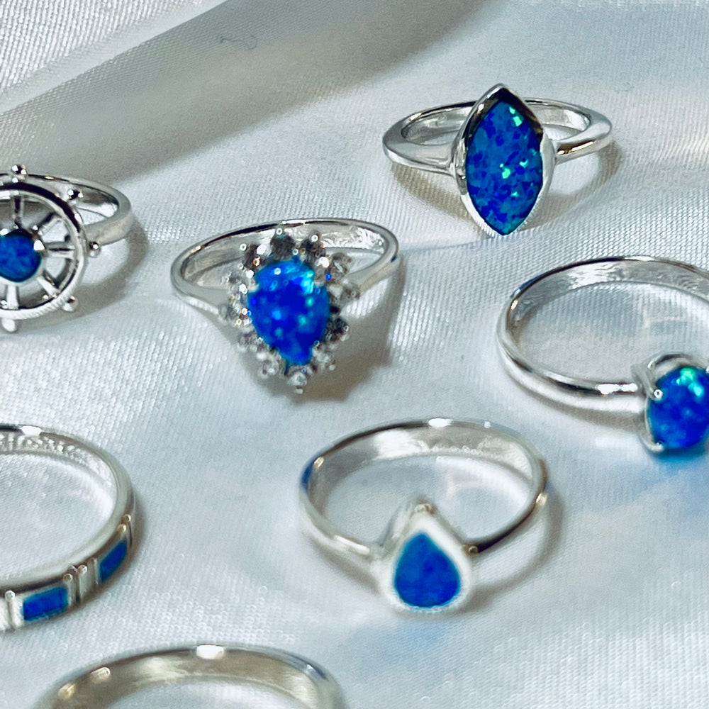 
                  
                    Elegant Opal Teardrop Ring with Cubic Zirconias engagement ring set.
                  
                