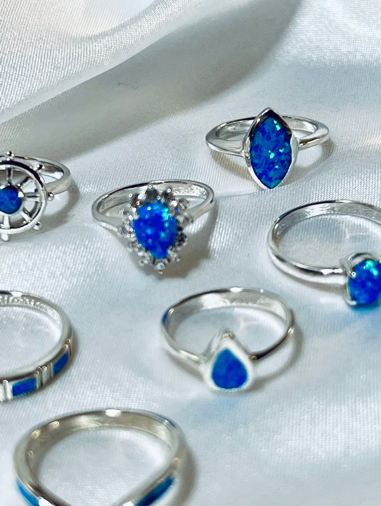 
                  
                    Elegant Opal Teardrop Ring with Cubic Zirconias engagement ring set.
                  
                