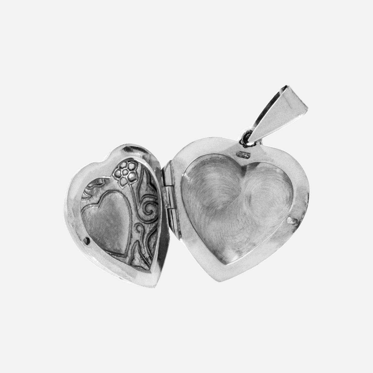 
                  
                    A Super Silver Small Heart Shaped Locket with Flower inside.
                  
                