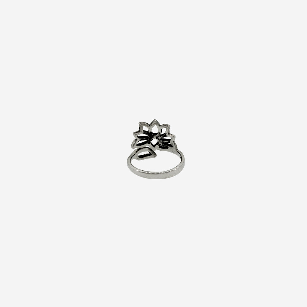 
                  
                    An adjustable Wrap Around Adjustable Lotus Flower Ring crafted from .925 sterling silver. This elegant piece is available for a final sale.
                  
                