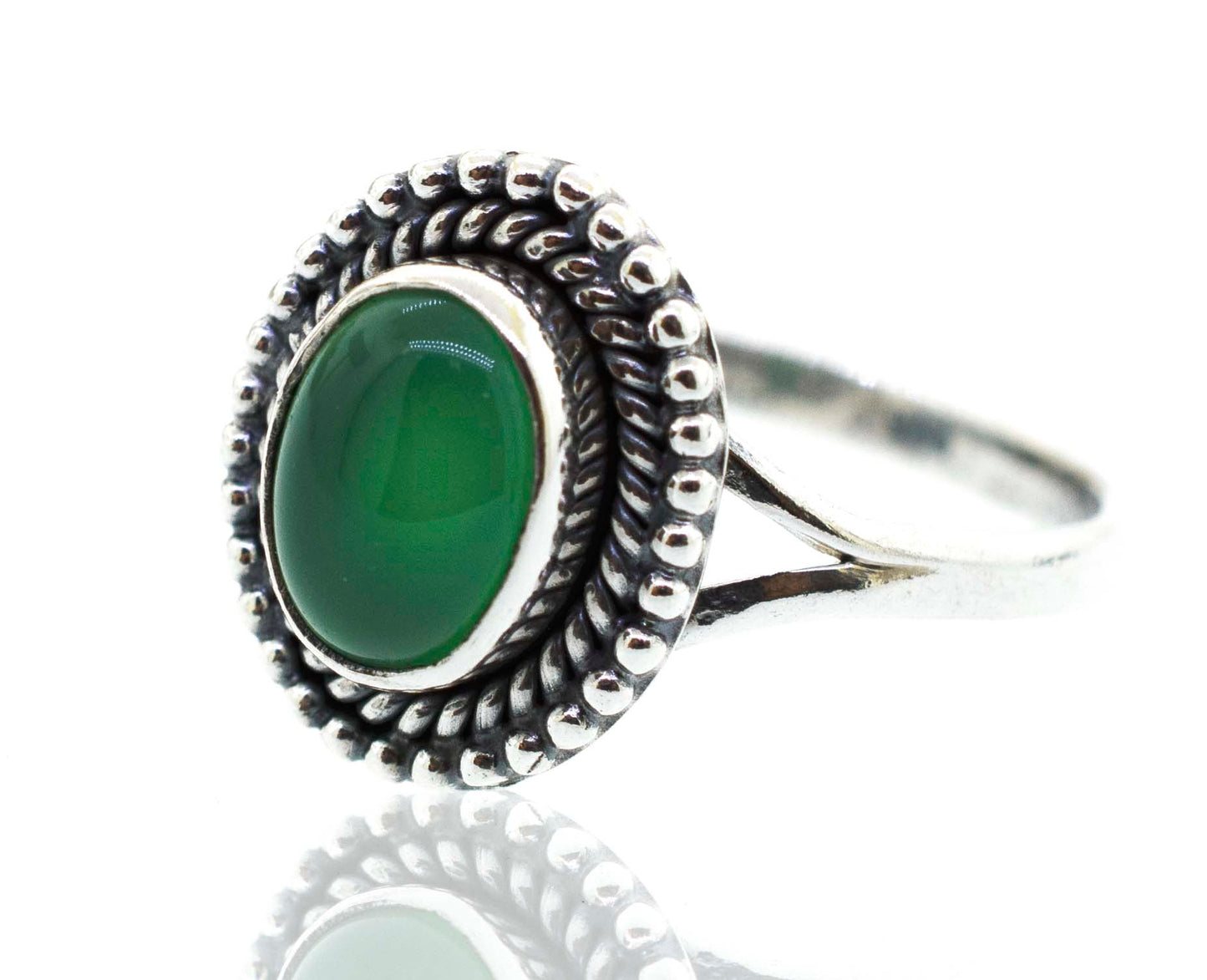 
                  
                    A Gemstone Oval Shield Ring with a green jade stone.
                  
                
