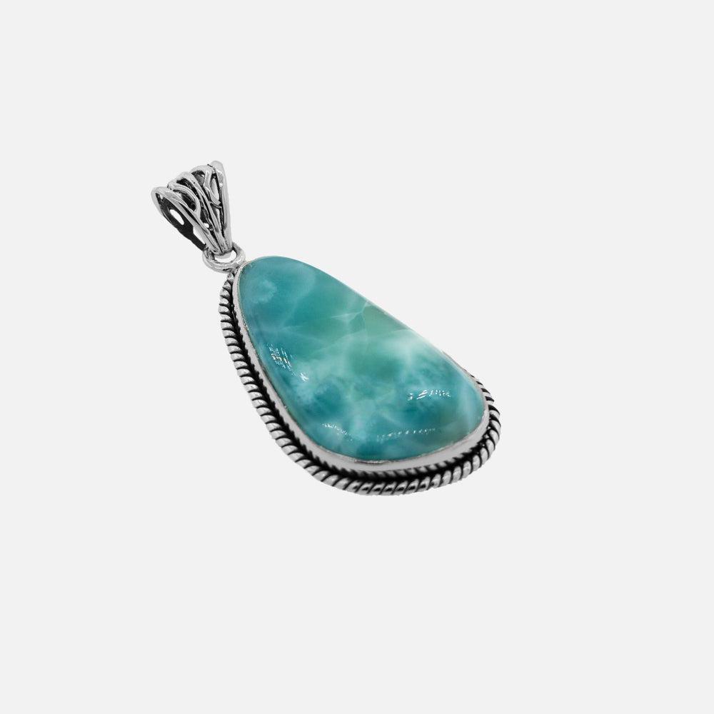 
                  
                    This eye-catching Medium Larimar Pendant with Rope Border is made of .925 Sterling Silver and showcases a beautiful turquoise stone. Brand Name: Super Silver.
                  
                