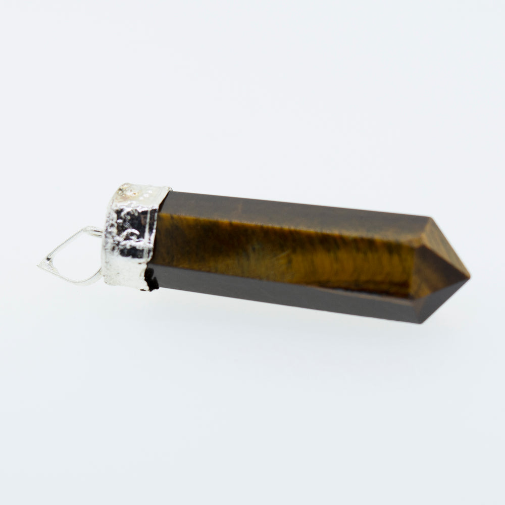 
                  
                    A Super Silver Raw Stone Obelisk Pendant layered on a white background.
                  
                