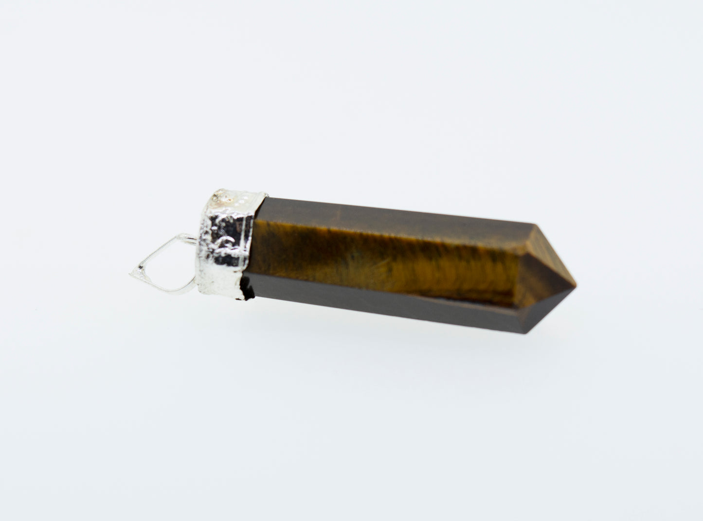 
                  
                    A Super Silver Raw Stone Obelisk Pendant layered on a white background.
                  
                