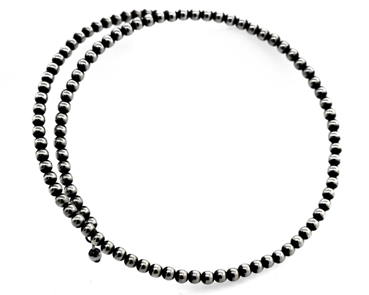 
                  
                    An edgy Super Silver Handcrafted Navajo Pearl Choker on a white background.
                  
                