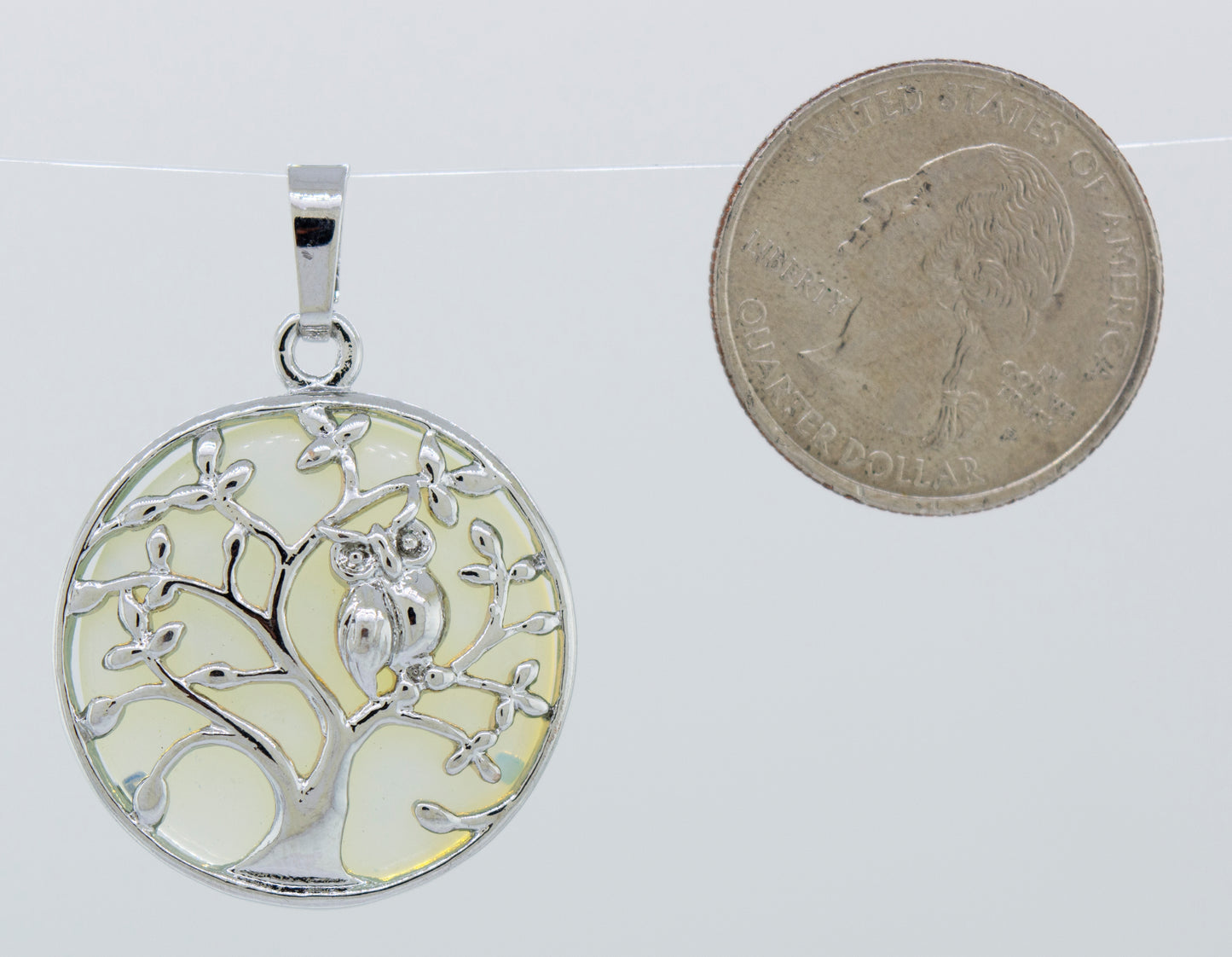 A Super Silver Owl and Tree Pendant.