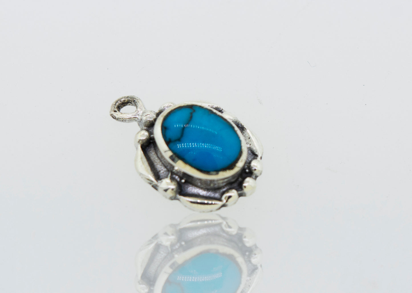 
                  
                    A Super Silver Beautiful Oval Stone pendant with a small oval turquoise stone.
                  
                