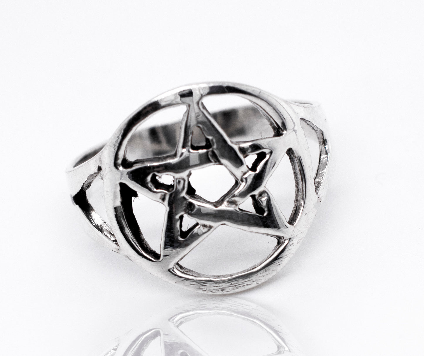 
                  
                    A sterling silver Pentagram Ring on a white surface.
                  
                