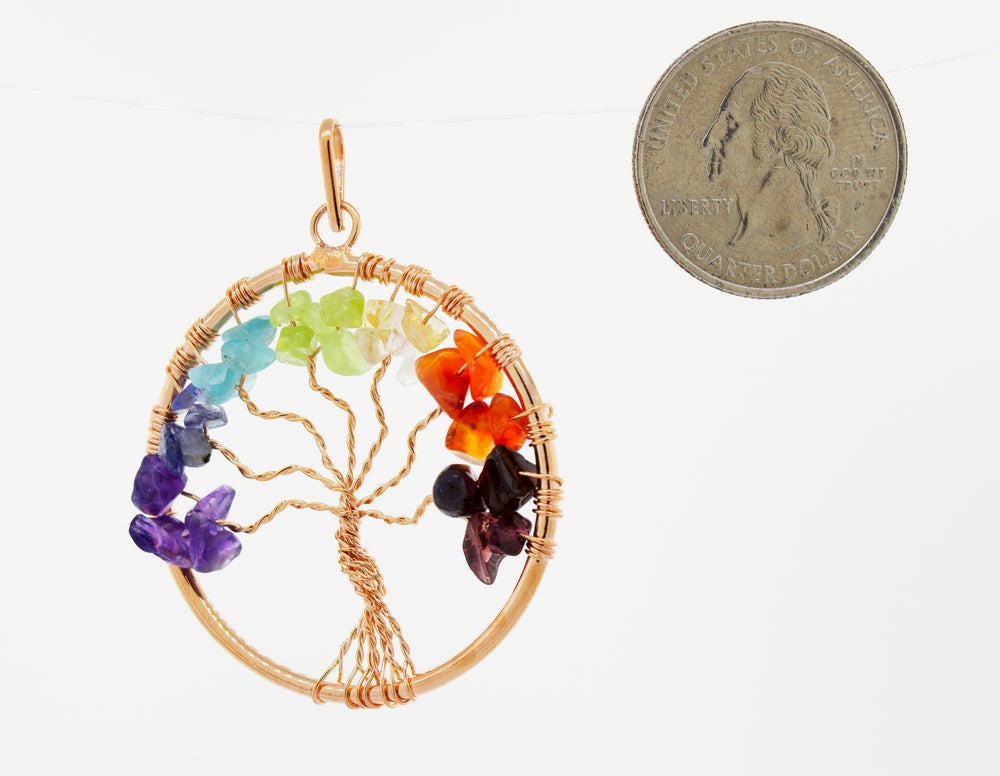 
                  
                    Wire-Wrapped Chakra Tree of Life Pendant
                  
                