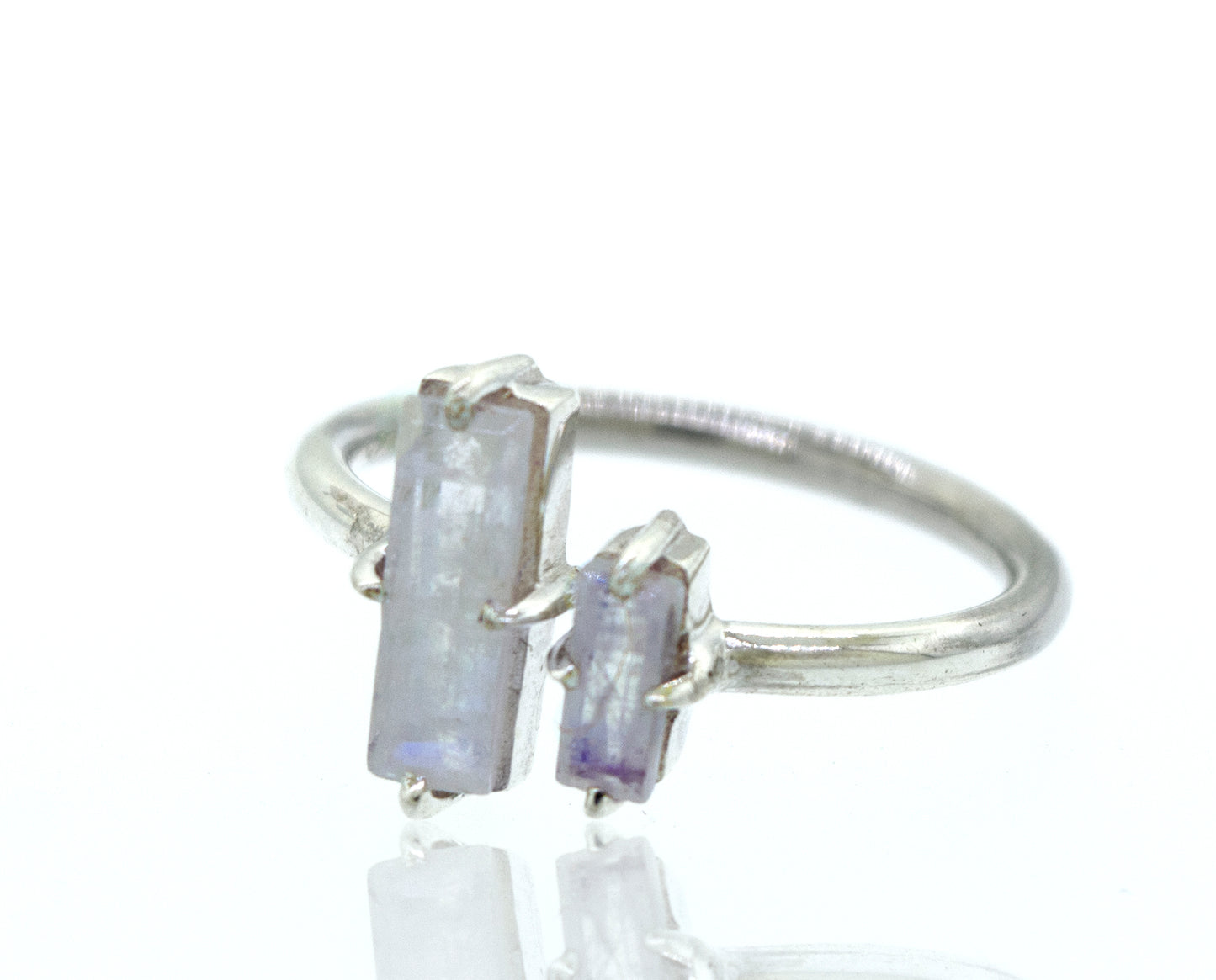 
                  
                    An adjustable Super Silver ring adorned with two Online Only Exclusive Adjustable Moonstone crystals of a mesmerizing purple hue.
                  
                