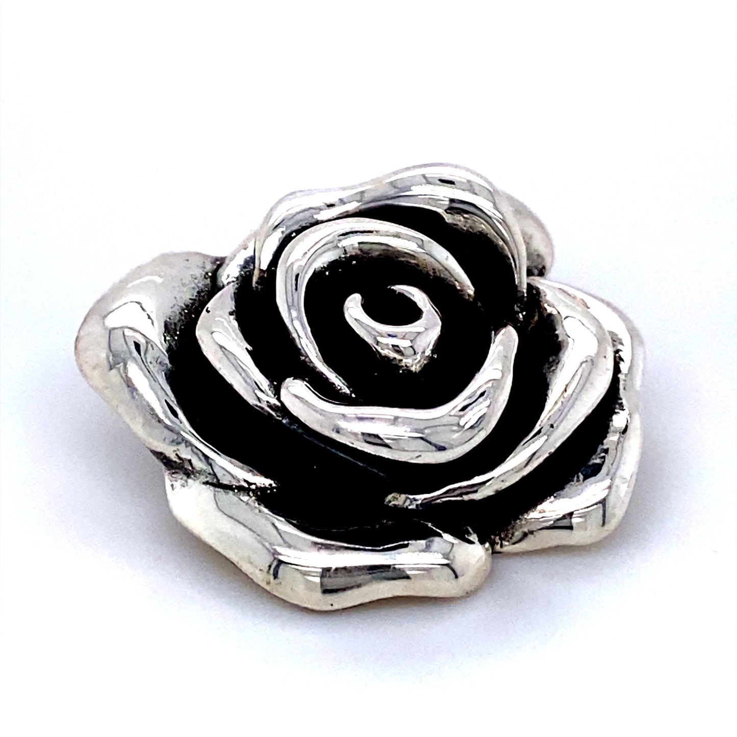 A Super Silver Stunning Electroformed Rose Pendant/Brooch on a white background.