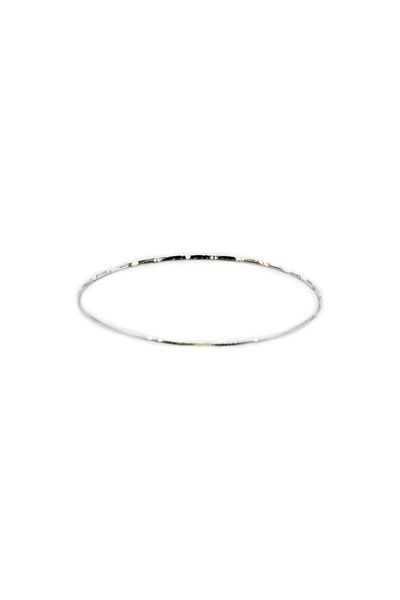 
                  
                    A Super Silver Delicate Faceted Cut Bangle Bracelet on a white background.
                  
                