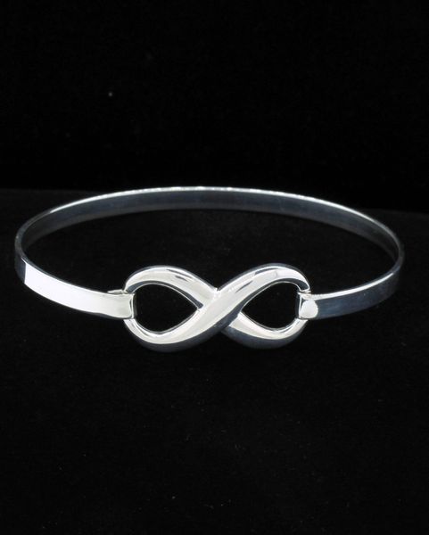 Sleek Super Silver Infinity Bracelet with a latch clasp.