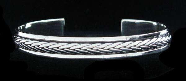 
                  
                    A stunning Super Silver braided cuff bracelet.
                  
                