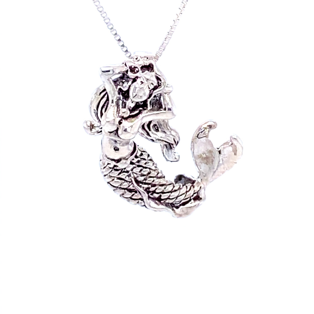 A Super Silver Relaxing Mermaid Charm with Fixed Bail necklace with a nautical lover charm on a chain.