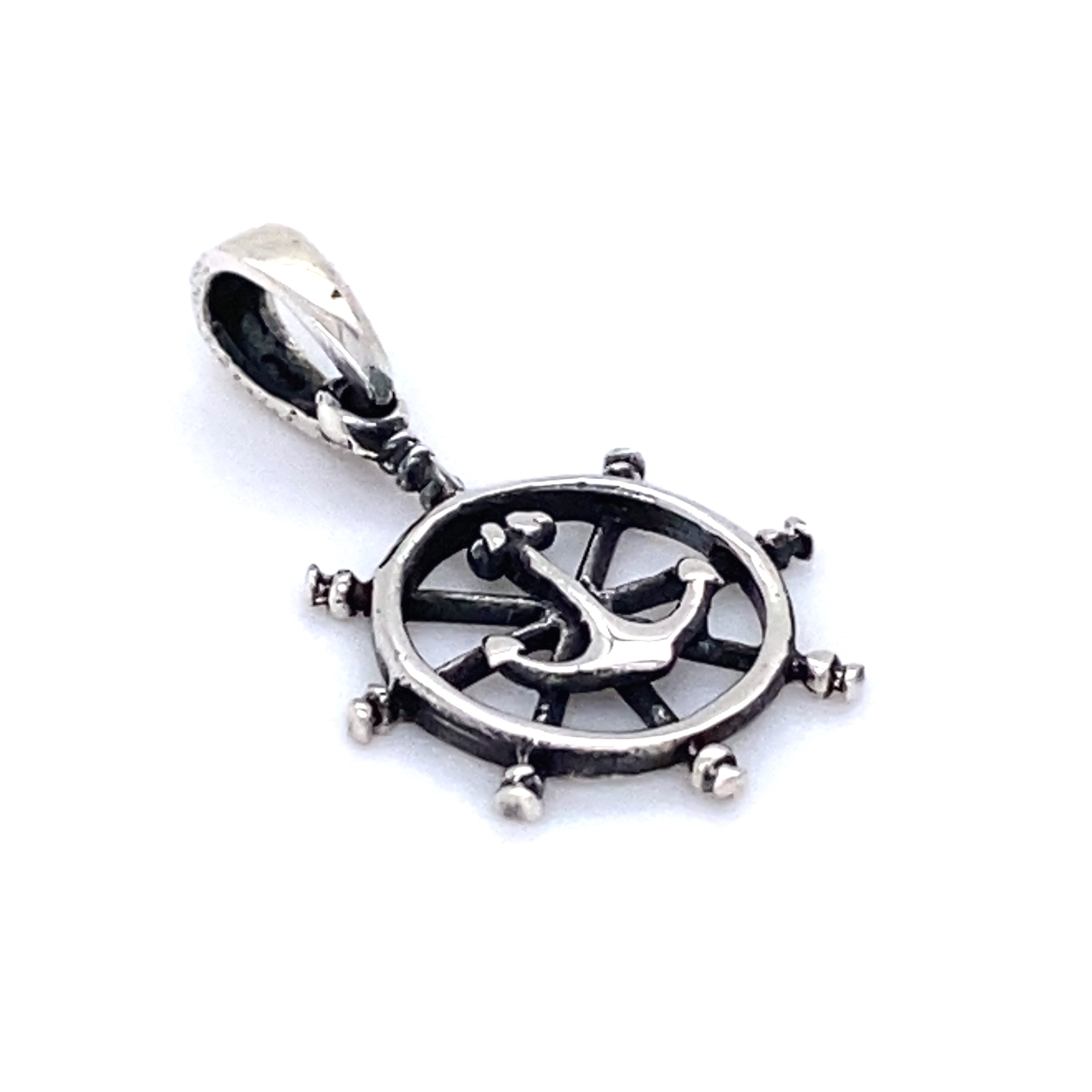 A Super Silver Ships Wheel Charm with Anchor pendant on a white background, perfect for nautical necklace enthusiasts.
