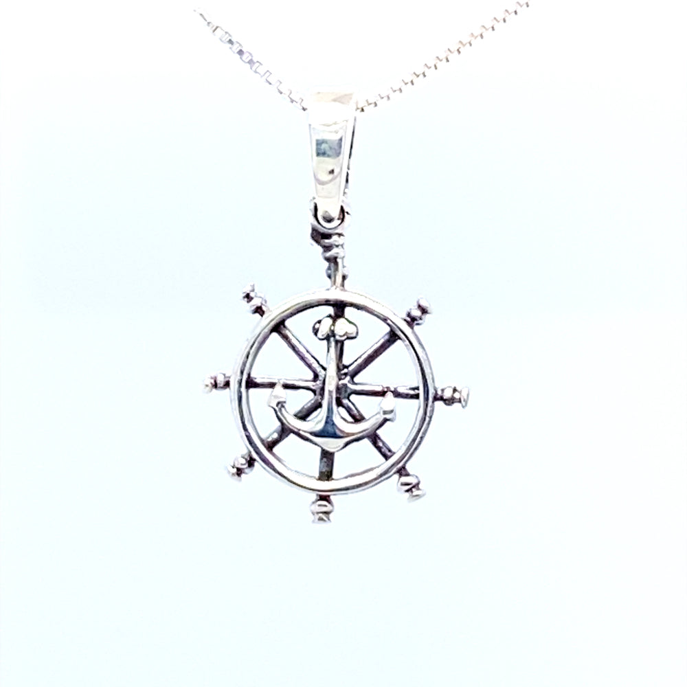 
                  
                    A Super Silver necklace featuring a Ships Wheel Charm with Anchor pendant, perfect for sea-fearing captains or those who love ocean-themed pendants.
                  
                