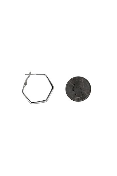 
                  
                    A pair of Small Flat Hexagon Hinged Hoops by Super Silver next to a penny.
                  
                