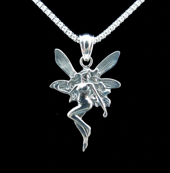 An enchanting Dancing Fairy Pendant by Super Silver on a black background.