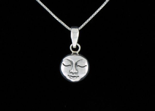 A Super Silver Small Moon Goddess pendant with a lunar charm depicting the face of the moon.