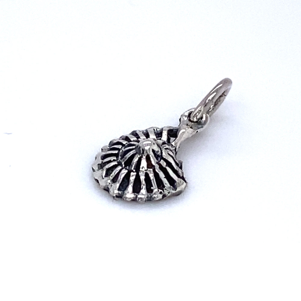 A Small Nautilus Pendant from Super Silver on a white background, perfect for sea lovers and exuding an ocean vibe.