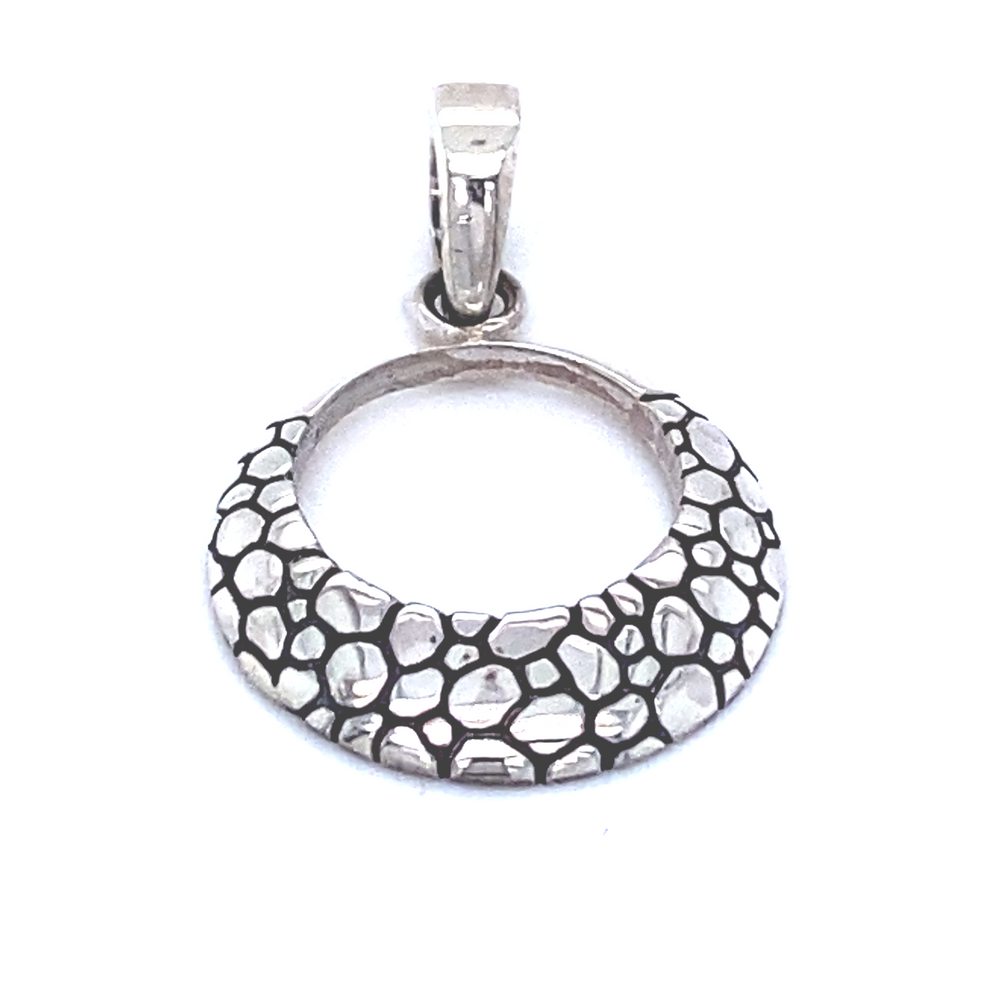 
                  
                    A modern take on a timeless design, featuring the Super Silver Modern Round Cobblestone Pendant with an open circle and a black and white pattern.
                  
                