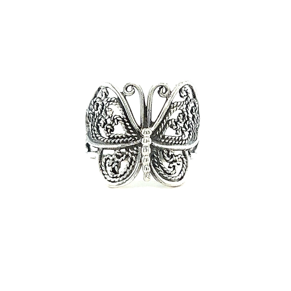 A minimalist silver Filigree Butterfly Ring with filigree details on a white background.