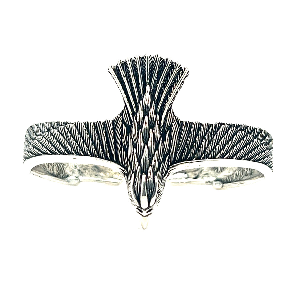 A Super Silver Unique Raven Cuff bracelet with an eagle symbol.