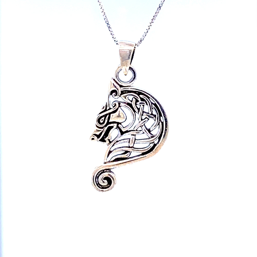 A Super Silver Celtic Dragon Head pendant.