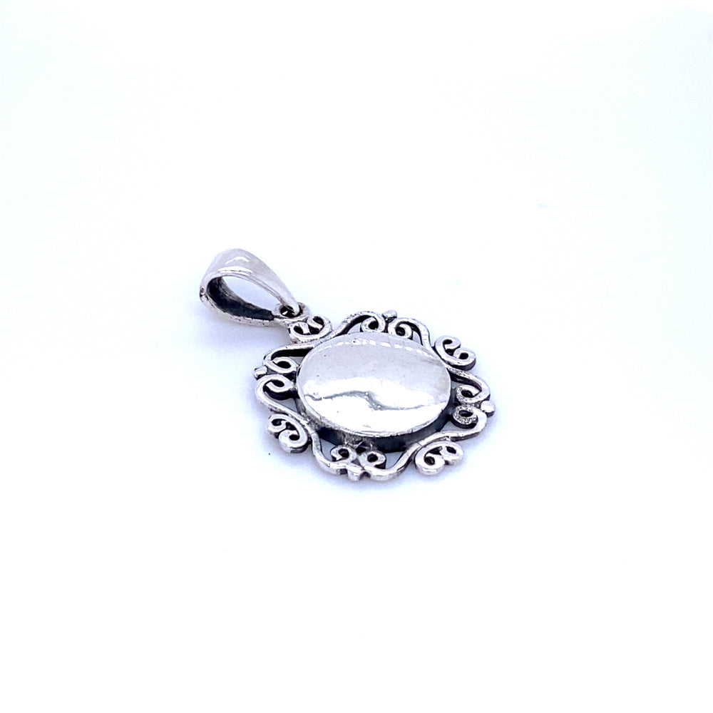 
                  
                    A Super Silver Engravable Pendant with Filigree Border with a white stone.
                  
                