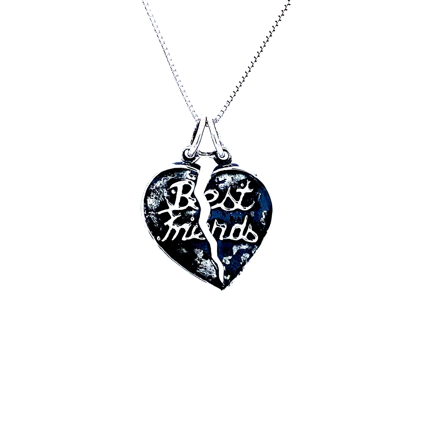 
                  
                    A Super Silver "Best Friends" Break Apart Charm necklace, serving as an affirmation of everlasting bond.
                  
                