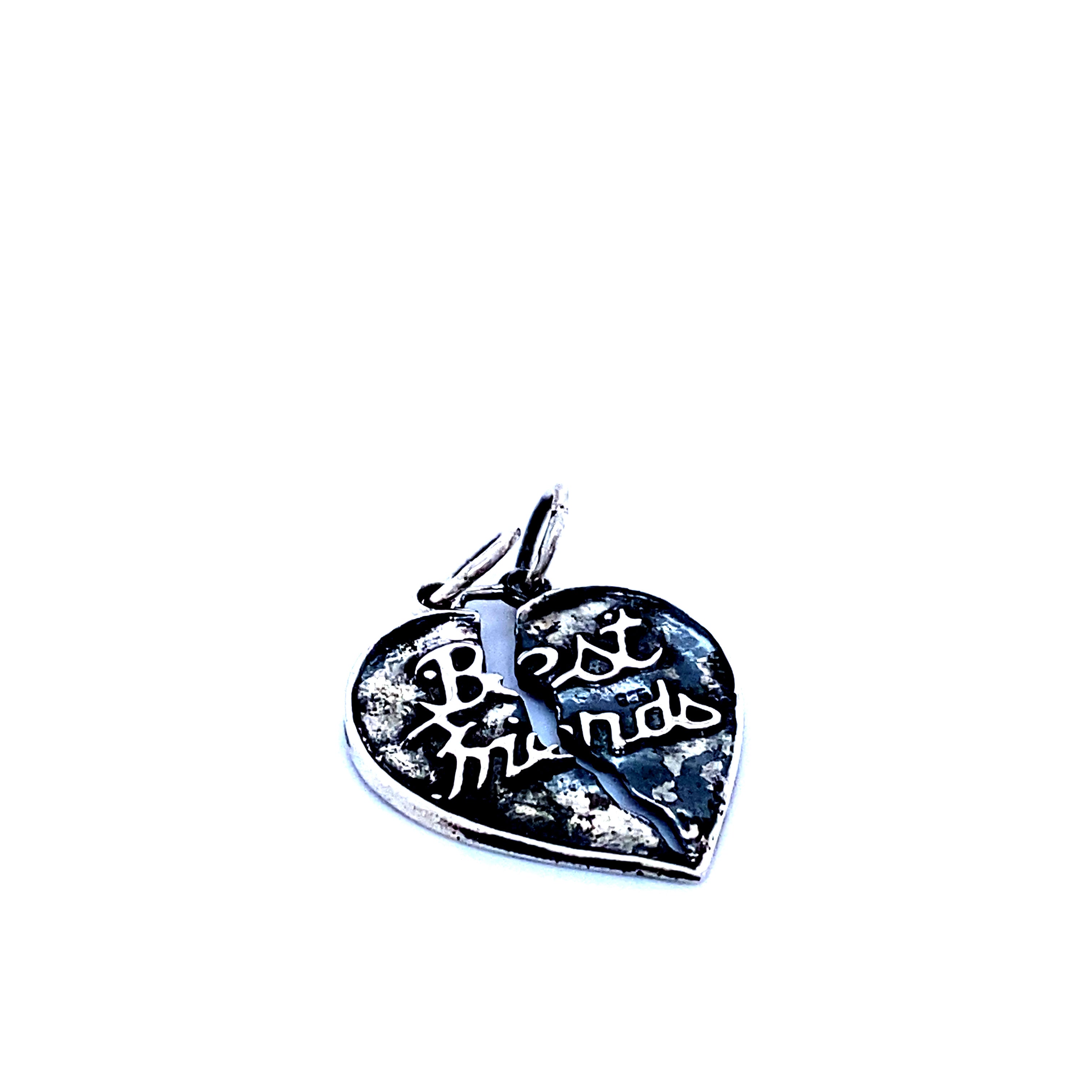 A Super Silver "Best Friends" Break Apart Charm with the affirmation 'best friends' engraved on it.