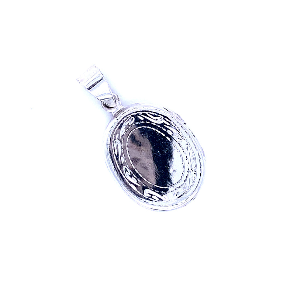 A Super Silver oval locket with etched border on a white background.