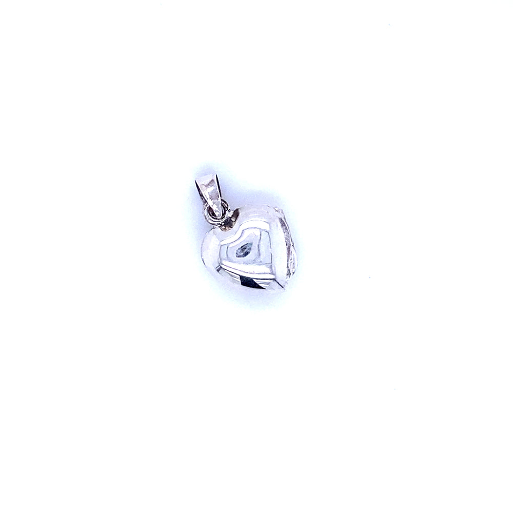 
                  
                    A Super Silver Dainty Heart Locket pendant on a white background.
                  
                
