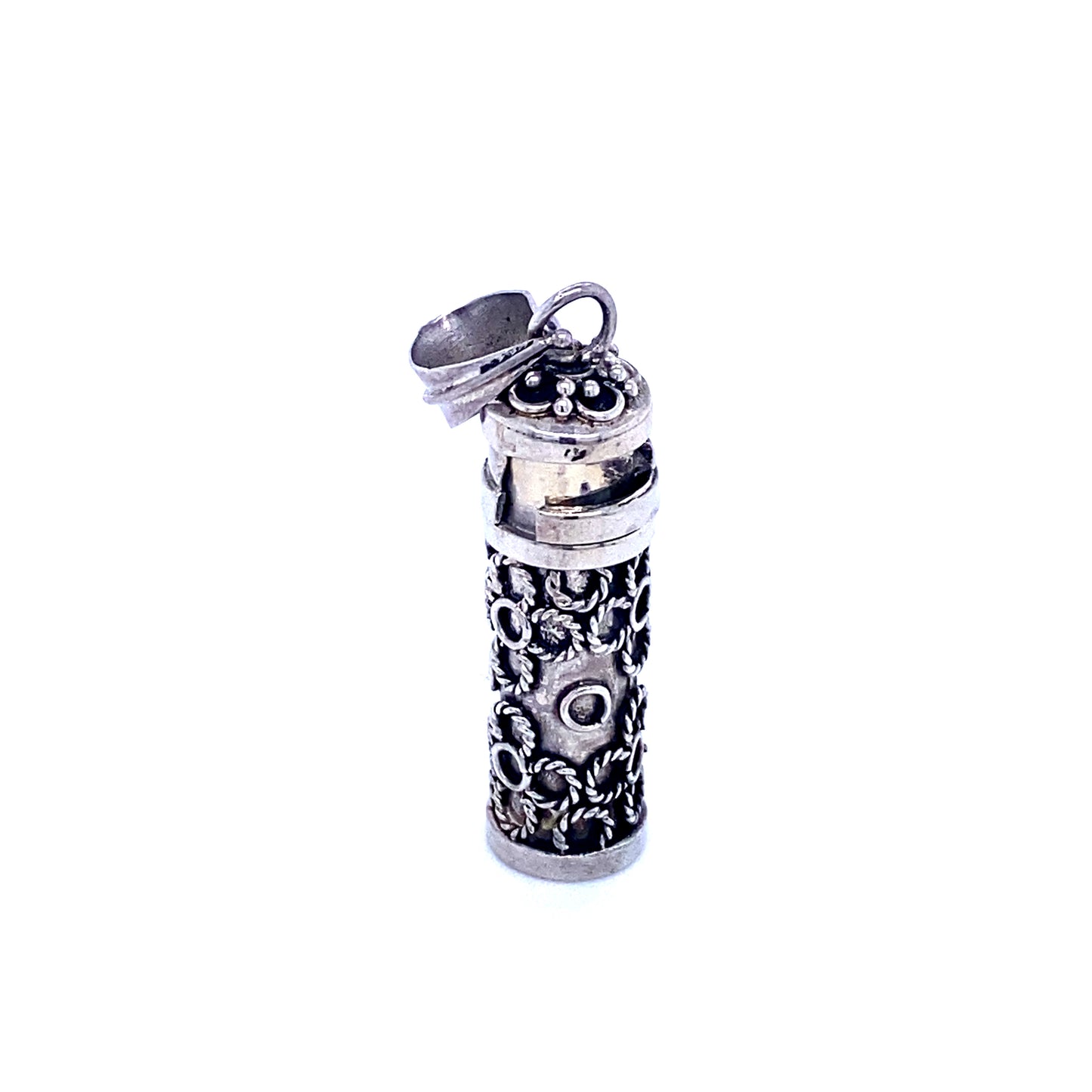 
                  
                    A Super Silver lighter adorned with an ornate design featuring religious scripture.
                  
                