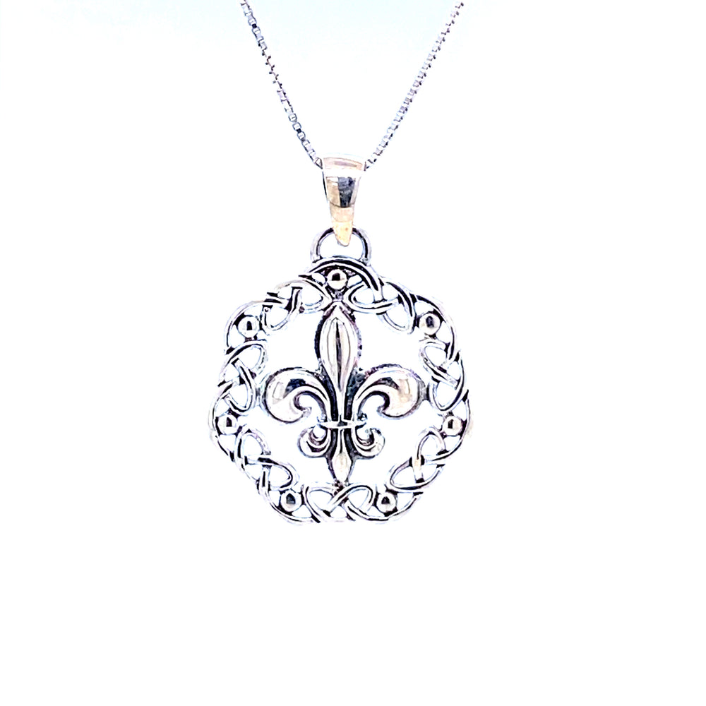 
                  
                    An ornate Fleur De Lis Charm With Celtic Weave pendant with old-world charm on a Super Silver silver chain.
                  
                