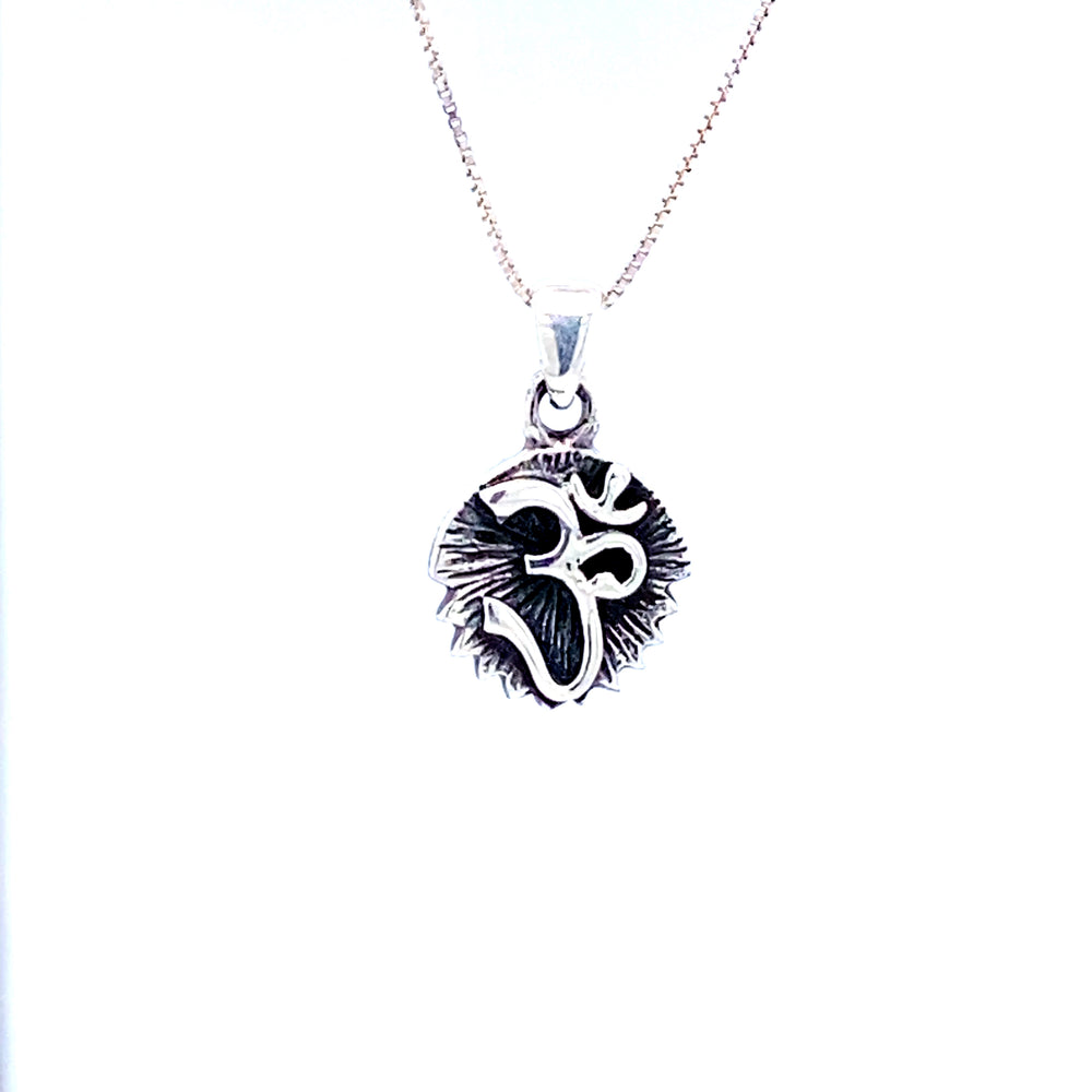 
                  
                    A Super Silver Om Charm with Burst Background on a white background.
                  
                