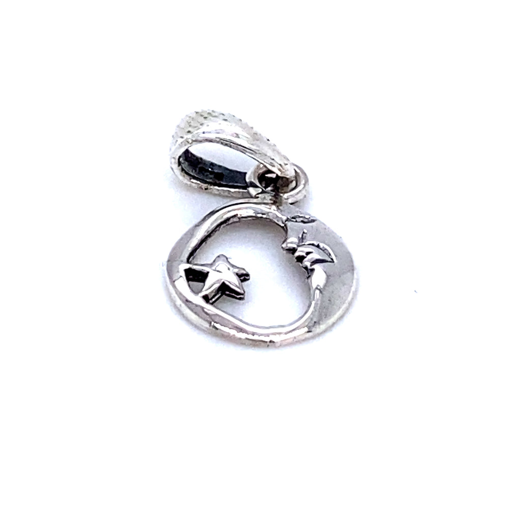 A Small Moon and Star Pendant with a heart and sky-lover vibe from Super Silver.