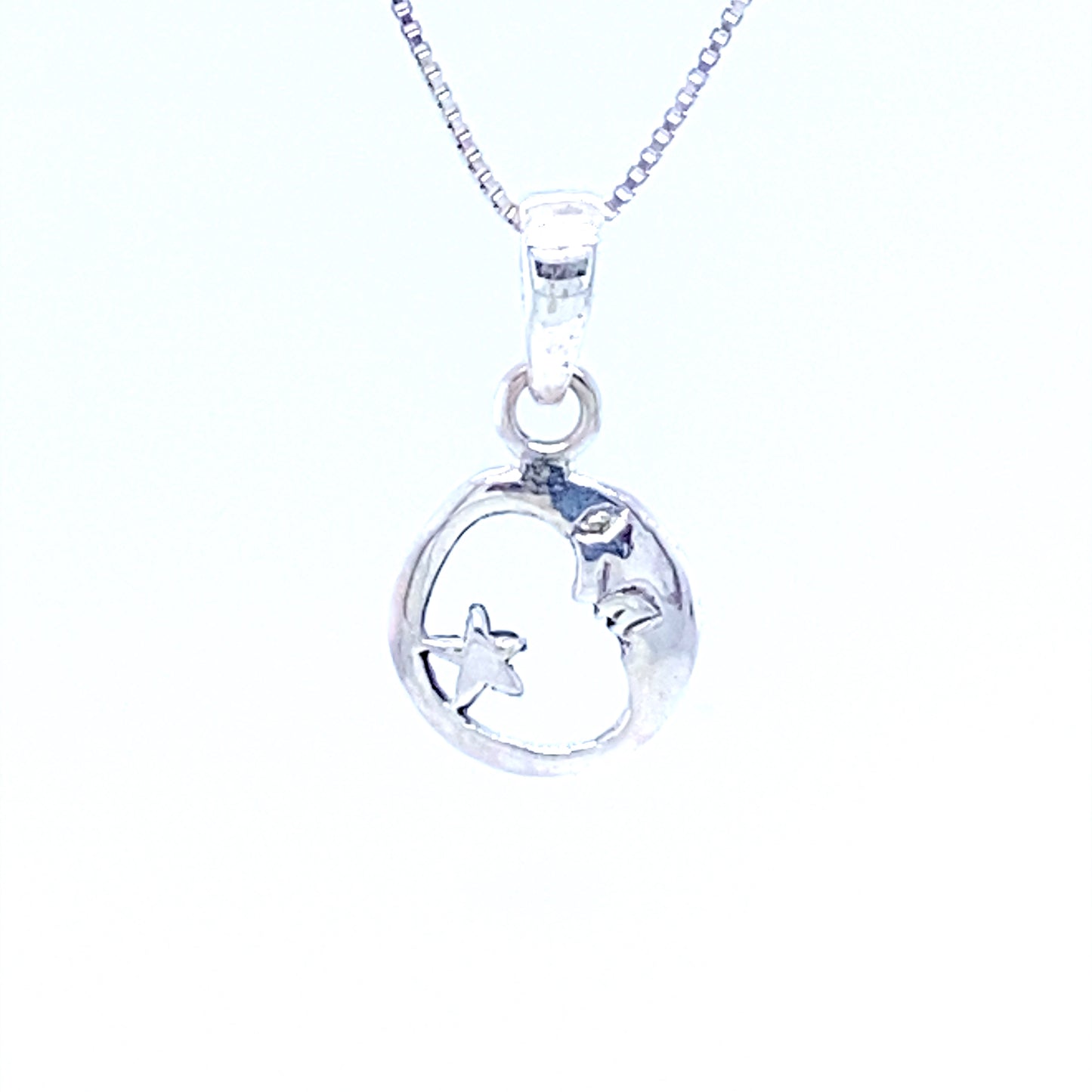 A Small Moon and Star Pendant from Super Silver with a sky-lover vibe.