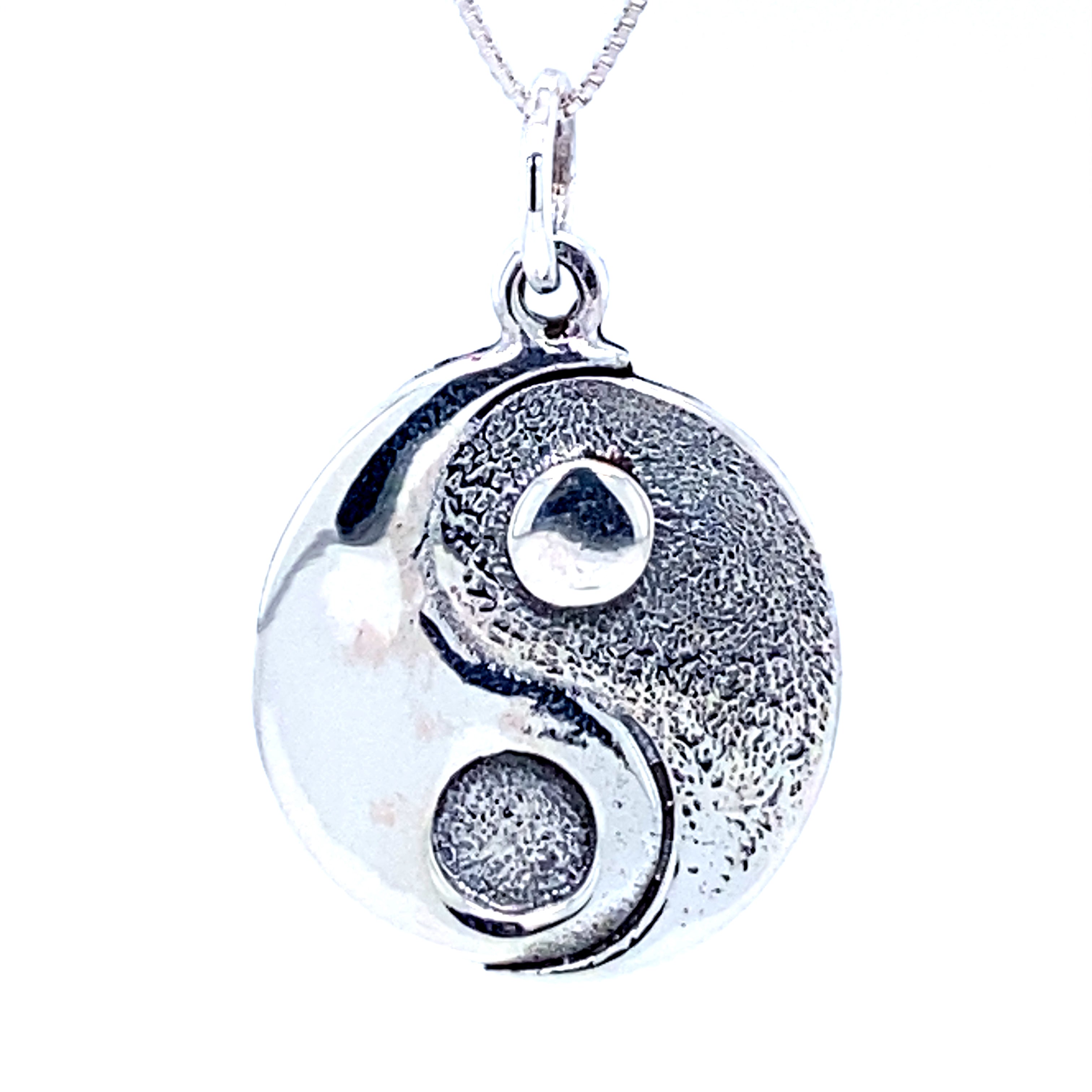 A Super Silver Yin Yang Pendant on a white background.
