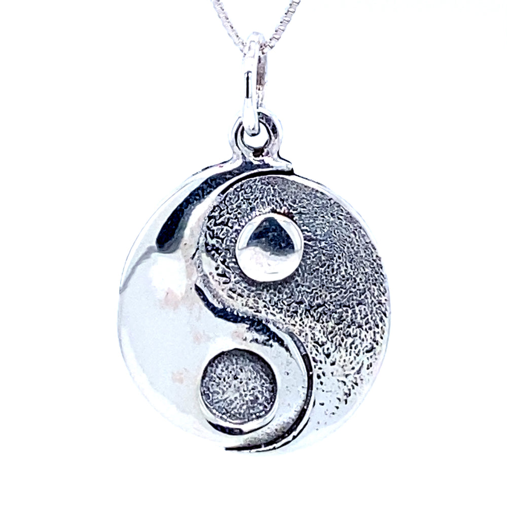 
                  
                    A Super Silver Yin Yang Pendant on a white background.
                  
                