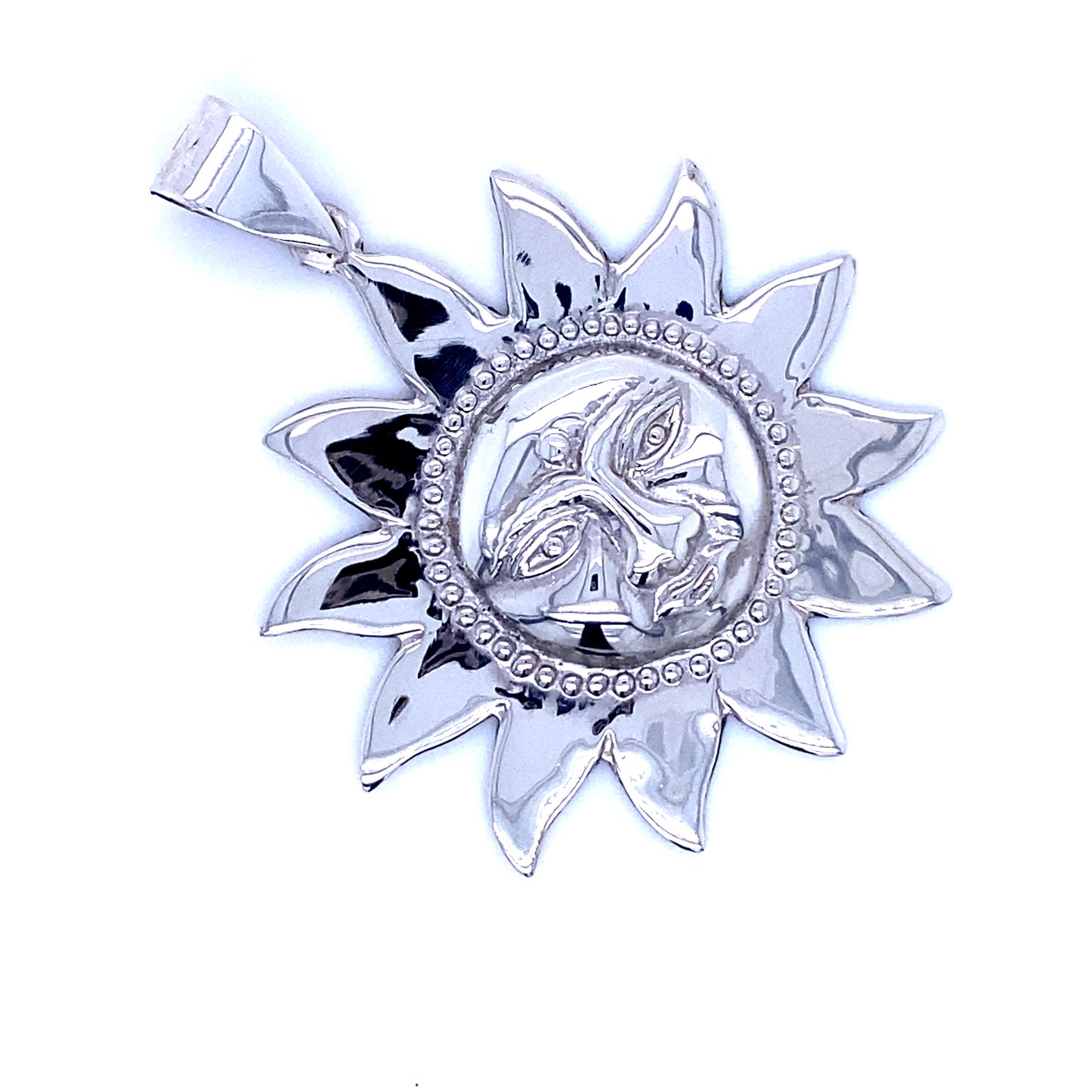 A Super Silver Sun God Pendant with diamonds on it, representing the Hindu Sun God.