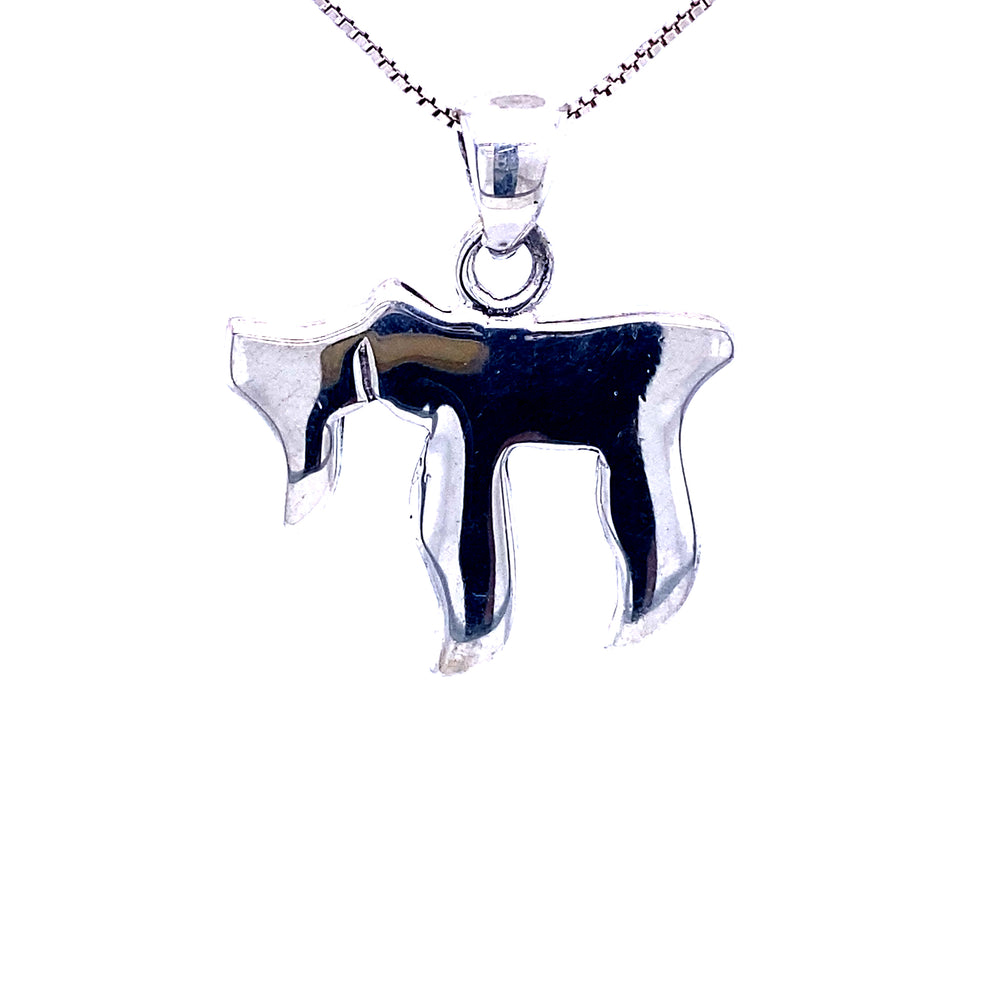 
                  
                    A Simple Hebrew Chai Symbol Pendant by Super Silver, featuring a black and white horse, serving as a symbol of strength and grace.
                  
                