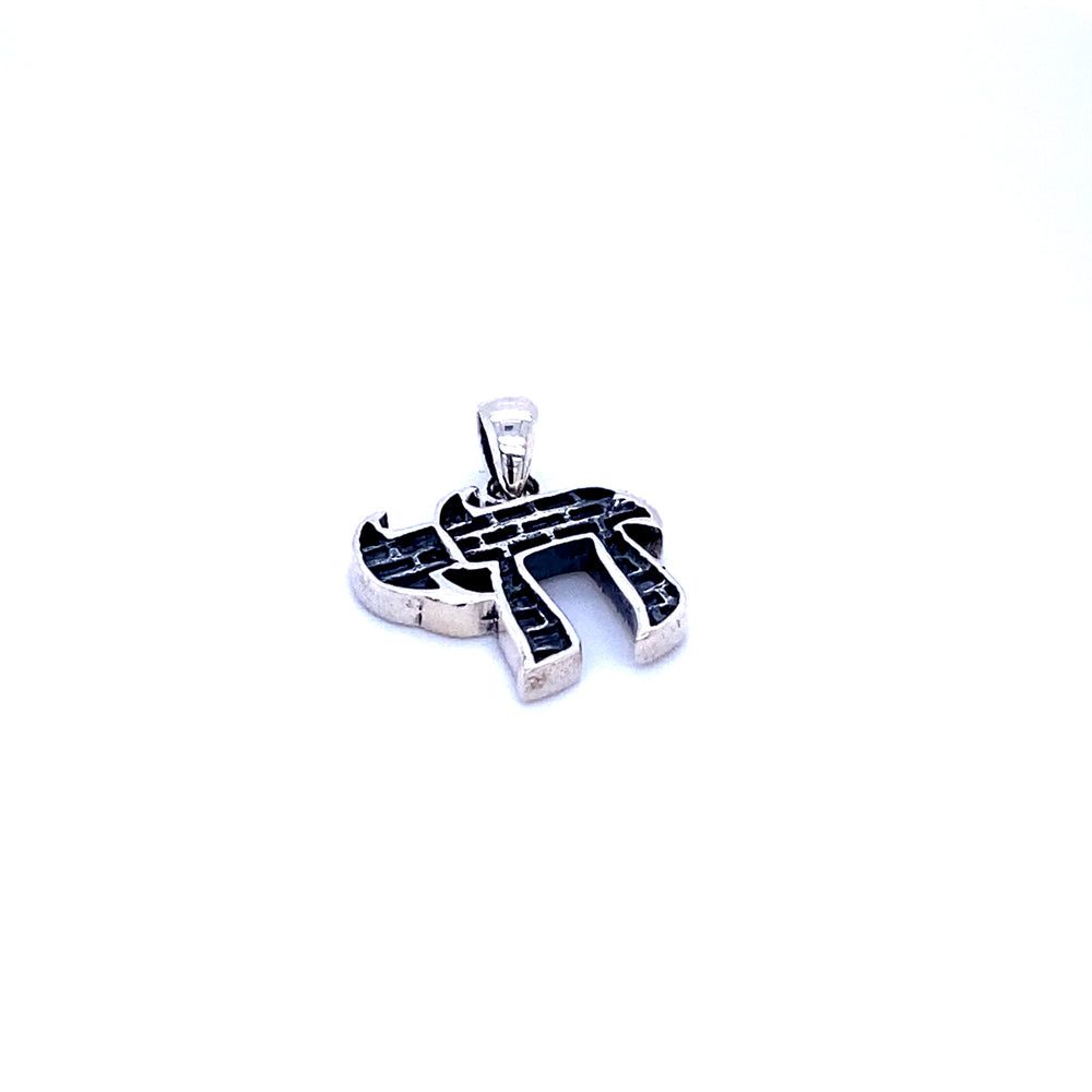 A silver Super Silver Chai Symbol Pendant with Brick Pattern, symbolizing Jewish heritage and the celebration of life, against a pristine white background.