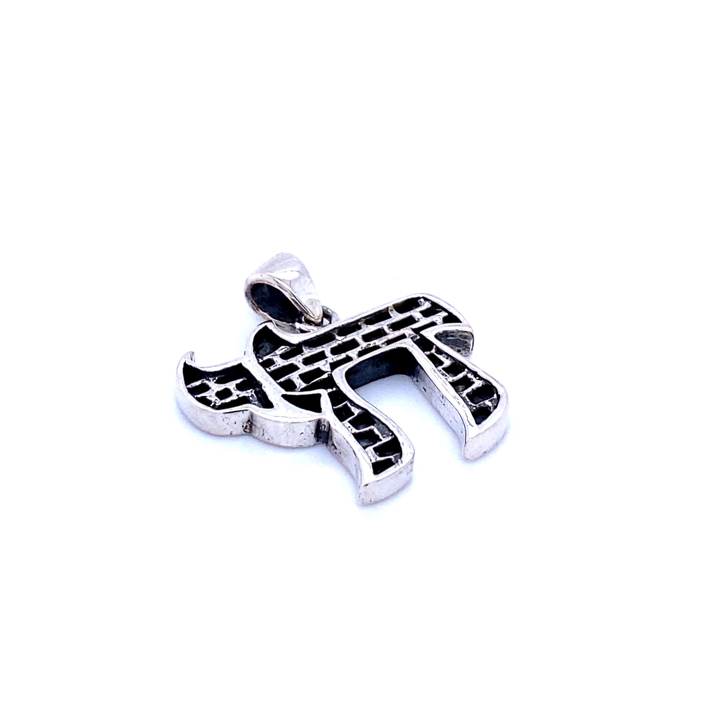 
                  
                    A Chai Symbol Pendant with Brick Pattern, celebrating Jewish heritage and the joy of life with a Super Silver pendant adorned with a Hebrew letter.
                  
                