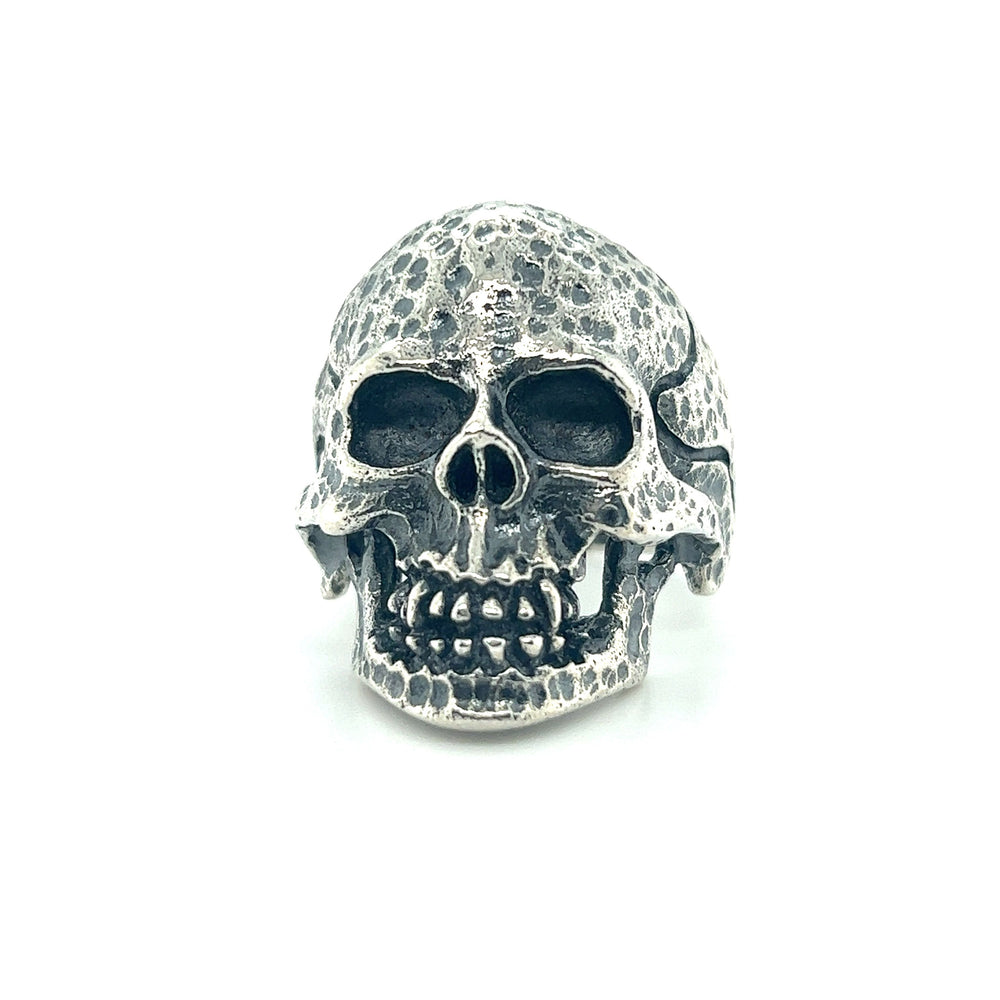 A Large Textured Skull Ring on a white background.